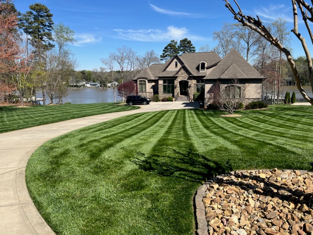 Striped lawn at a lakefront property